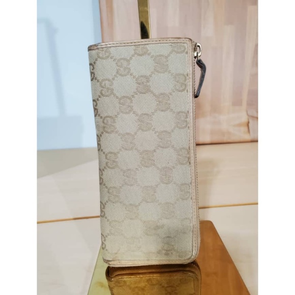 Gucci Handbags - Authentic GUCCI Calfskin Monogram Zip Around Wallet Tan